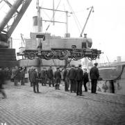 A Glasgow locomotive is loaded on to a ship