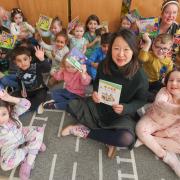 Layla Yang read to the children in traditional Mandarin