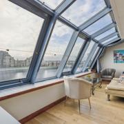 The Glasgow duplex has three bedrooms and 'panoramic views of the River Clyde'