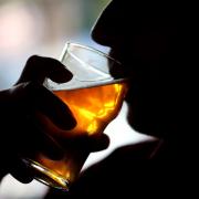 Generic image of man drinking alcohol