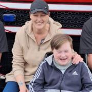 Caz with her son Liam who attends the school