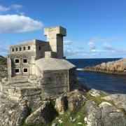 Hermit's Castle overlooks Achmelvich Bay, one of the best beaches in the world