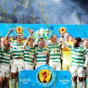 Celtic's Callum McGregor lifts the trophy following the Scottish Gas Men's Scottish Cup final at Barclays Hampden