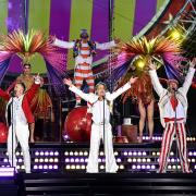 SOUTHAMPTON, ENGLAND - MAY 29: (L-R) Gary Barlow, Mark Owen and Howard Donald of Take That perform live on stage during the 
