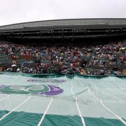 Rain delays play on Wimbledon’s outside courts