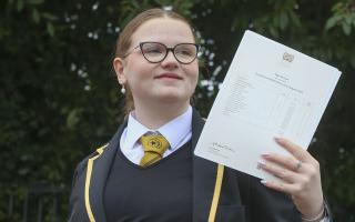 Skye Duncan, who missed three years of school and lost an arm to cancer, is celebrating after receiving excellent grades