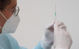 Generic image of doctor with vaccine
