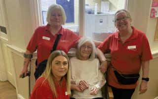 Annie with the care home staff