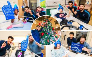 Basketball team pay visit to young hospital patients