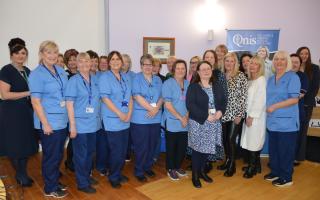 Jacqueline Meek, second from the right on the front row, with colleagues at the Queen’s Nursing Institute Scotland award for long service celebration event