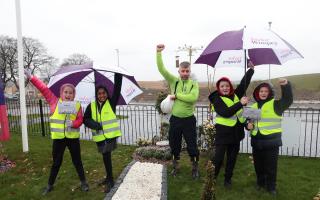 Bethany and Charlie reveal their mini sustainable show home gardens at Taylor Wimpey’s Monument Way in Robroyston. Also pictured are Paul Alexander from DC Landscapes and Gillian Lamont, Taylor Wimpey’s local sales executive