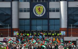 Protestors pictured outside Hampden Park ahead of Scotland match