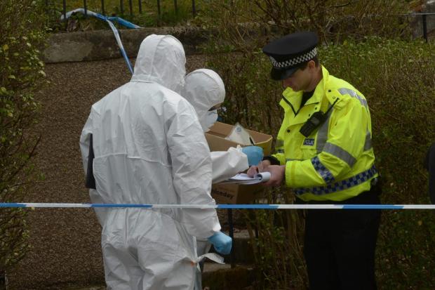 Glasgow Times: Missing student Karen Buckley... No 11 Dorchester Avenue, Kelvindale, the home of Alexander Pacteau who was the last person to see Karen Buckley with police activity and the entrance cordened off with Police tape..Picture shows forensic police officers en