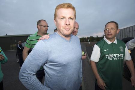 Glasgow Times: Welcome aboard: Neil Lennon leaves Hibernian's training centre on Wednesday night