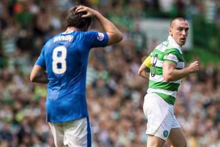 Glasgow Times: Celtic's Scott Brown (right) with Joey Barton. Picture: SNS