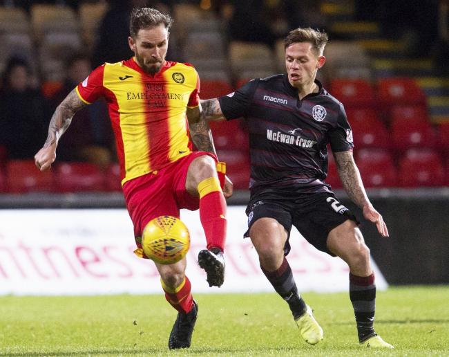Martin Woods has called upon Partick Thistle to step up to the plate in Saturday's basement battle against Ross County.