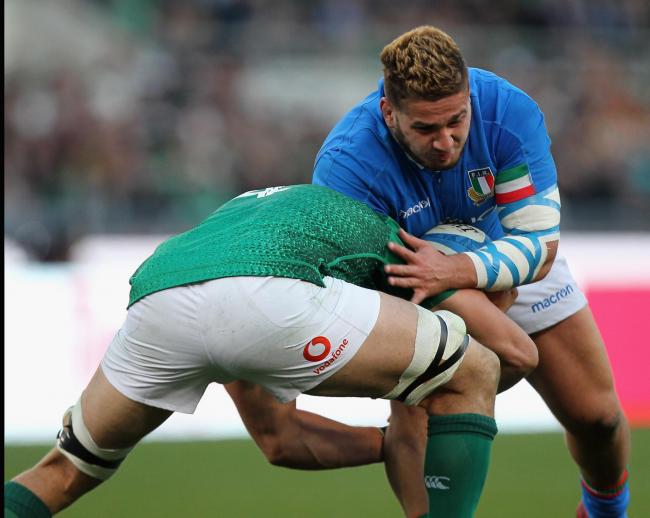 Tiziano Pasquali, playing for Italy, is tackled by Ireland's Ultan Dillane during their Guinness Six Nations match last weekend