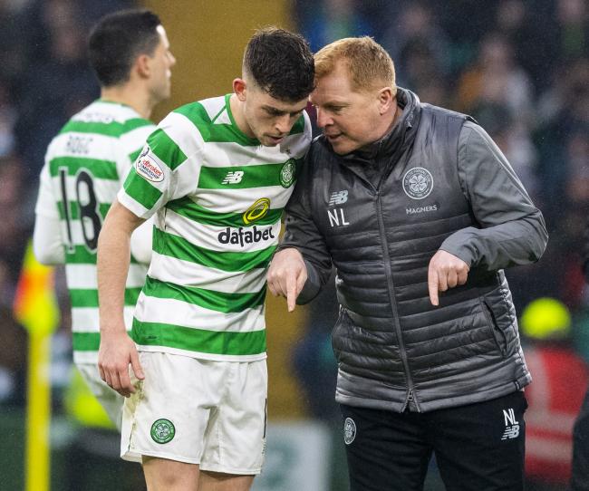Celtic manager Neil Lennon, right, talks to Ryan Christie on Saturday.