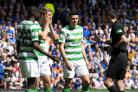 The Celtic players can't believe referee Kevin Clancy only booked Rangers player Jon Flanagan for elbowing Scott Brown.